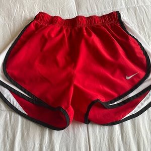 red nike running shorts